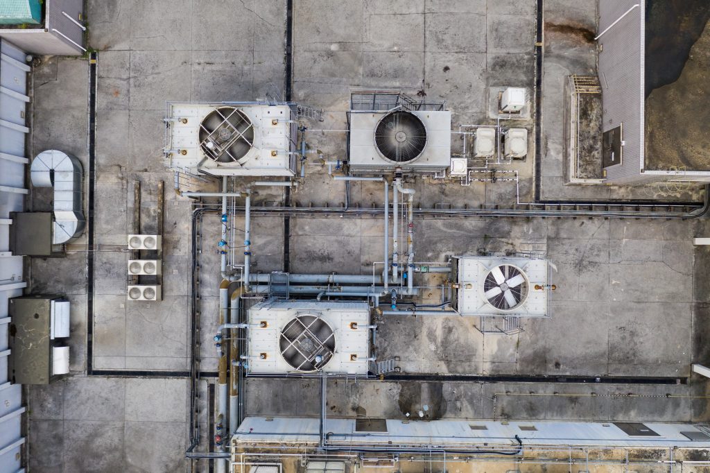 Icons representing AC repair, filter change, coil cleaning, thermostat installation, and other AC servicing tasks offered in Dubai.