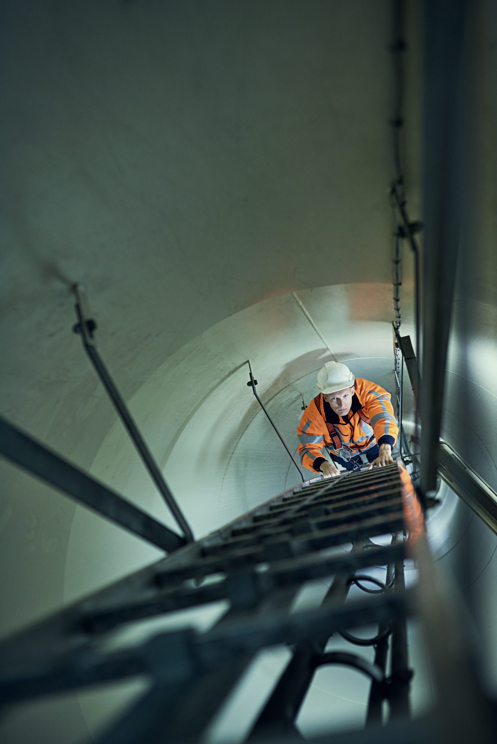 nationwide tank cleaning UAE inspection inside large water tank with portable lighting