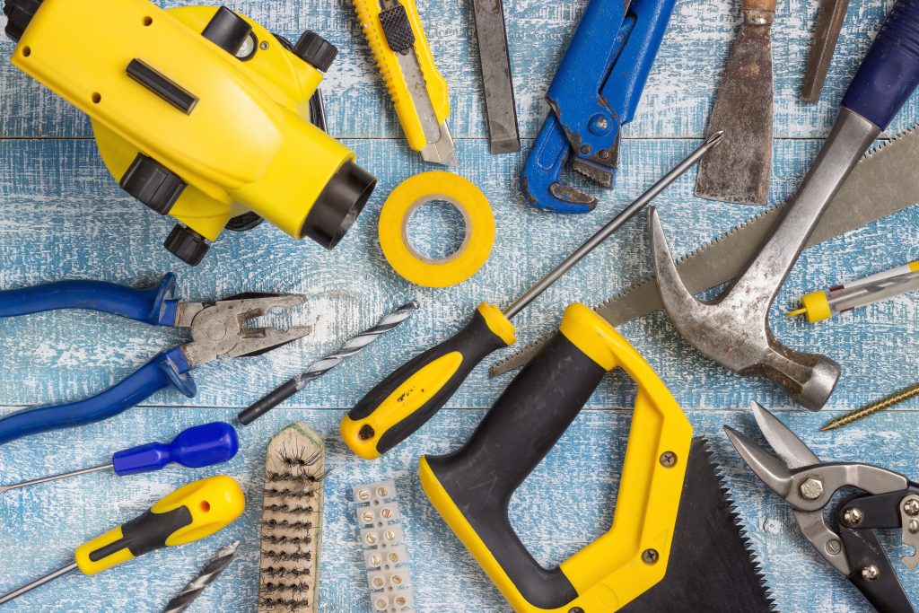 Collage of handymen in Sharjah performing multiple home repair tasks including plumbing, electrical, and furniture assembly.