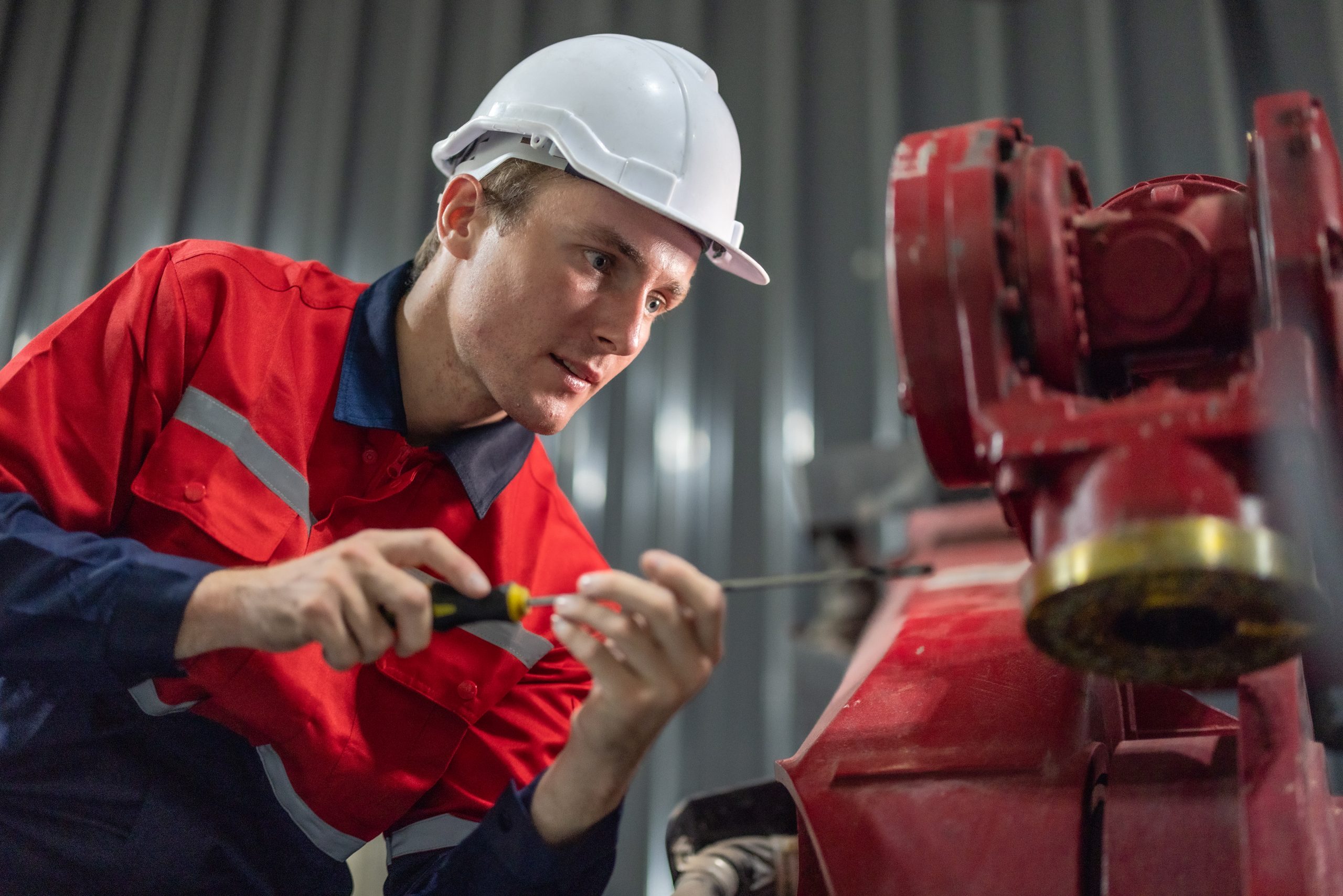 Technician performing general maintenance in UAE villa.