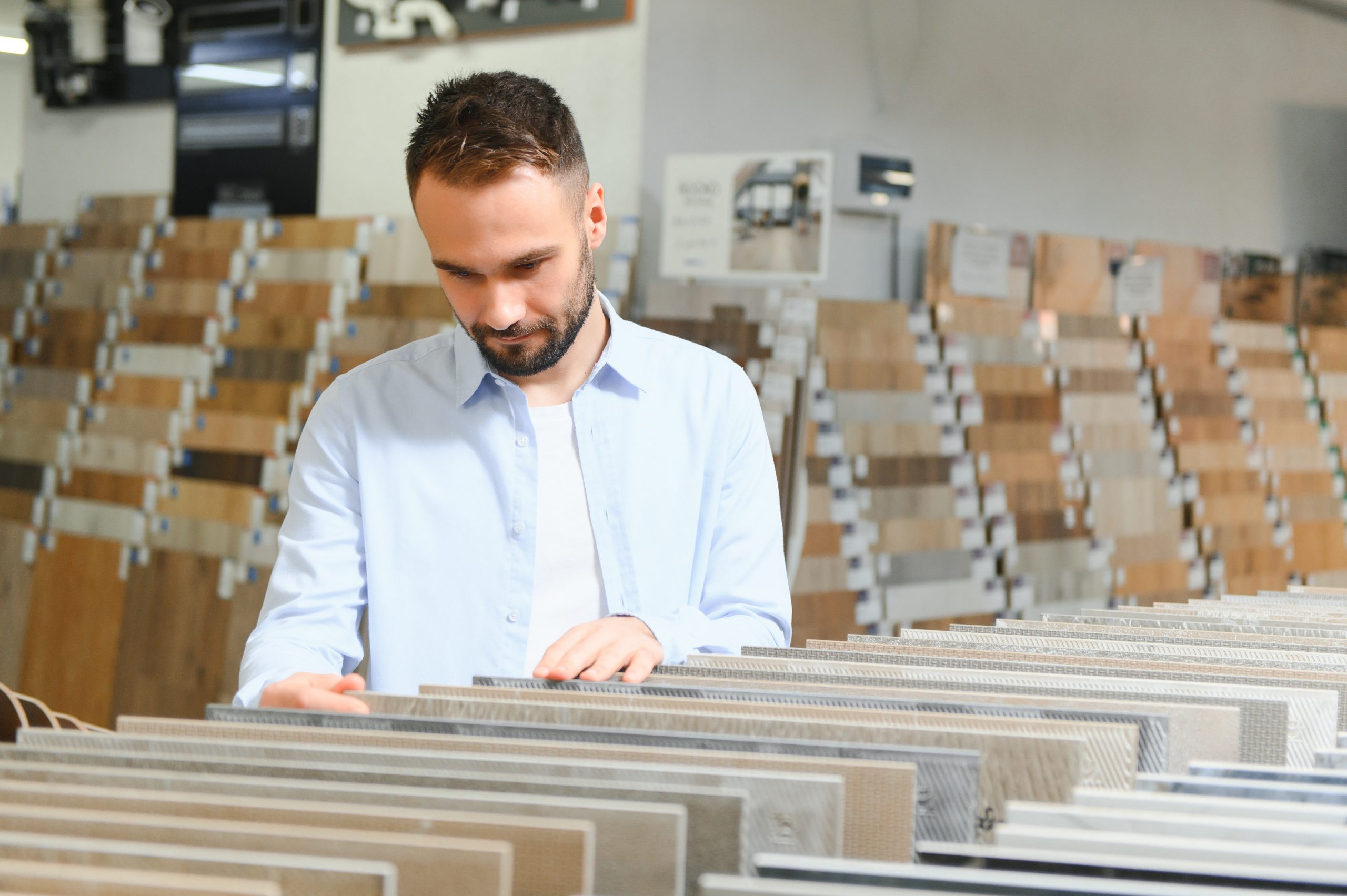 Interlock tiles Dubai - customer selecting patterns and colors.