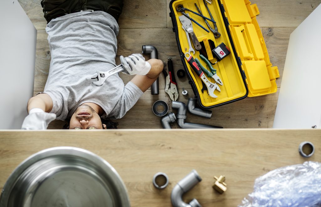 Handyman providing home maintenance and plumbing repair in Sharjah.