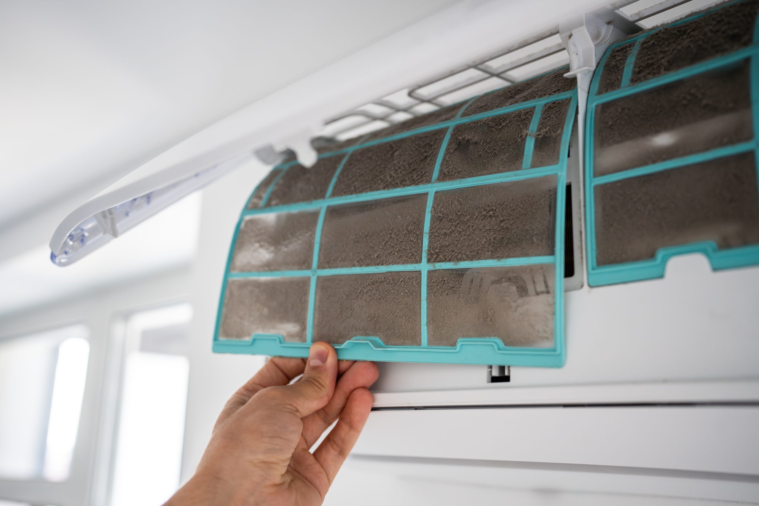 Dust storm AC cleaning UAE using industrial duct cleaning tools in villa.