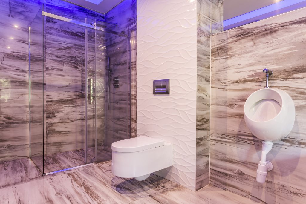 Bathroom tiling Dubai - marble wall and porcelain floor tiles.