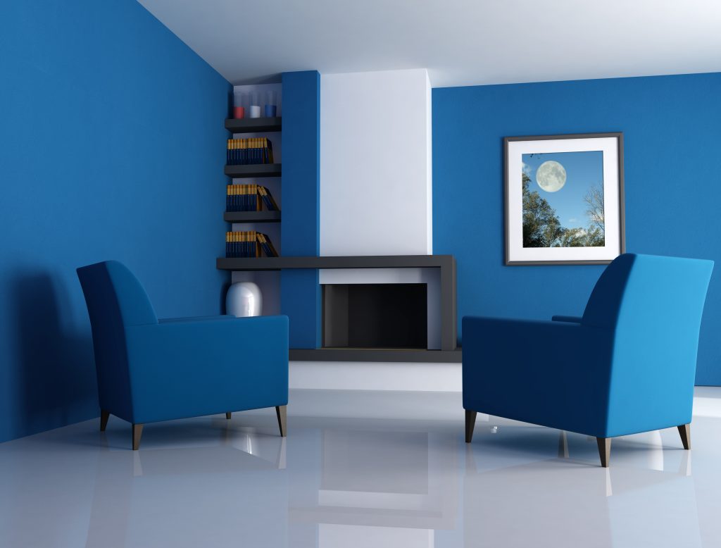 painter Ajman applying smooth interior wall paint finish in modern living room