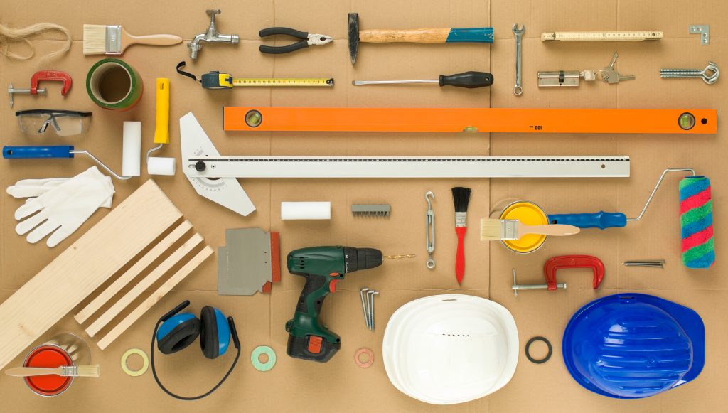 Collage of bed, wardrobe, dining table, and office desk being assembled in Dubai, representing full furniture assembly services.