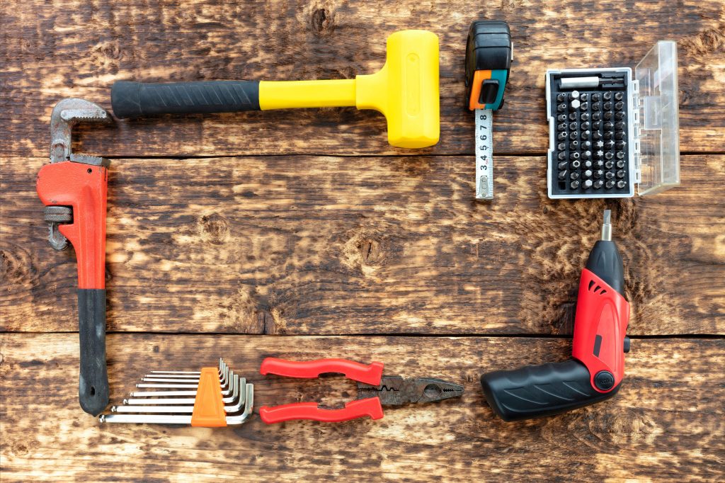 Collage of handyman UAE performing tasks like plumbing fixes, furniture assembly, painting touch-ups, and electrical repairs across emirates.