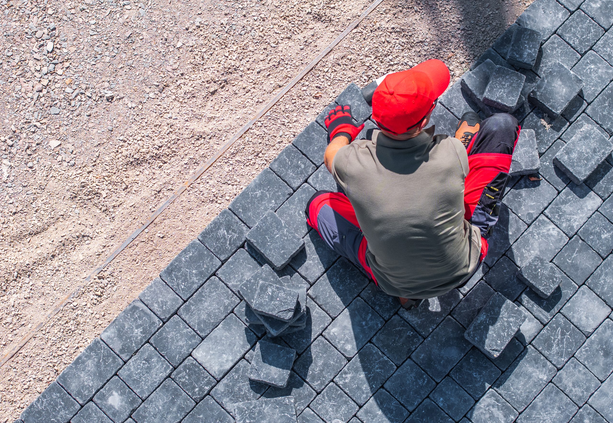 Paver installation Dubai - team laying durable outdoor flooring.