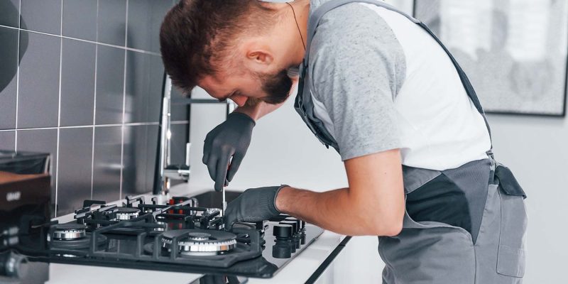 young-professional-plumber-in-grey-uniform-working-resize.jpg young-professional-plumber-in-grey-uniform-working-resize.jpg